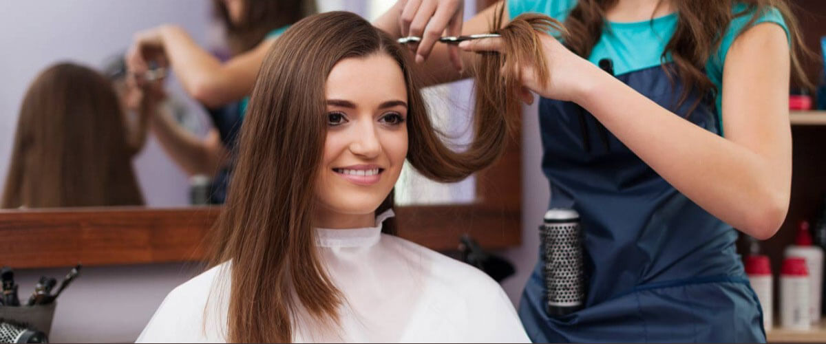 making hairstyle in salon